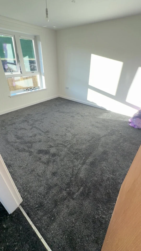 Soft grey carpet professionally fitted in a Dumfries home